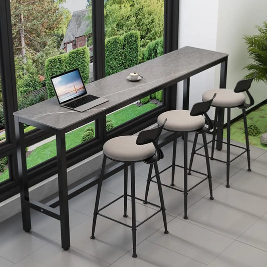 Tables de bar modernes avec plateau en pierre gris tourterelle et repose-pieds en acier