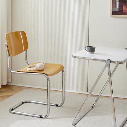 Chaise de salle à manger simple en métal sans accoudoirs, dossier plein jaune