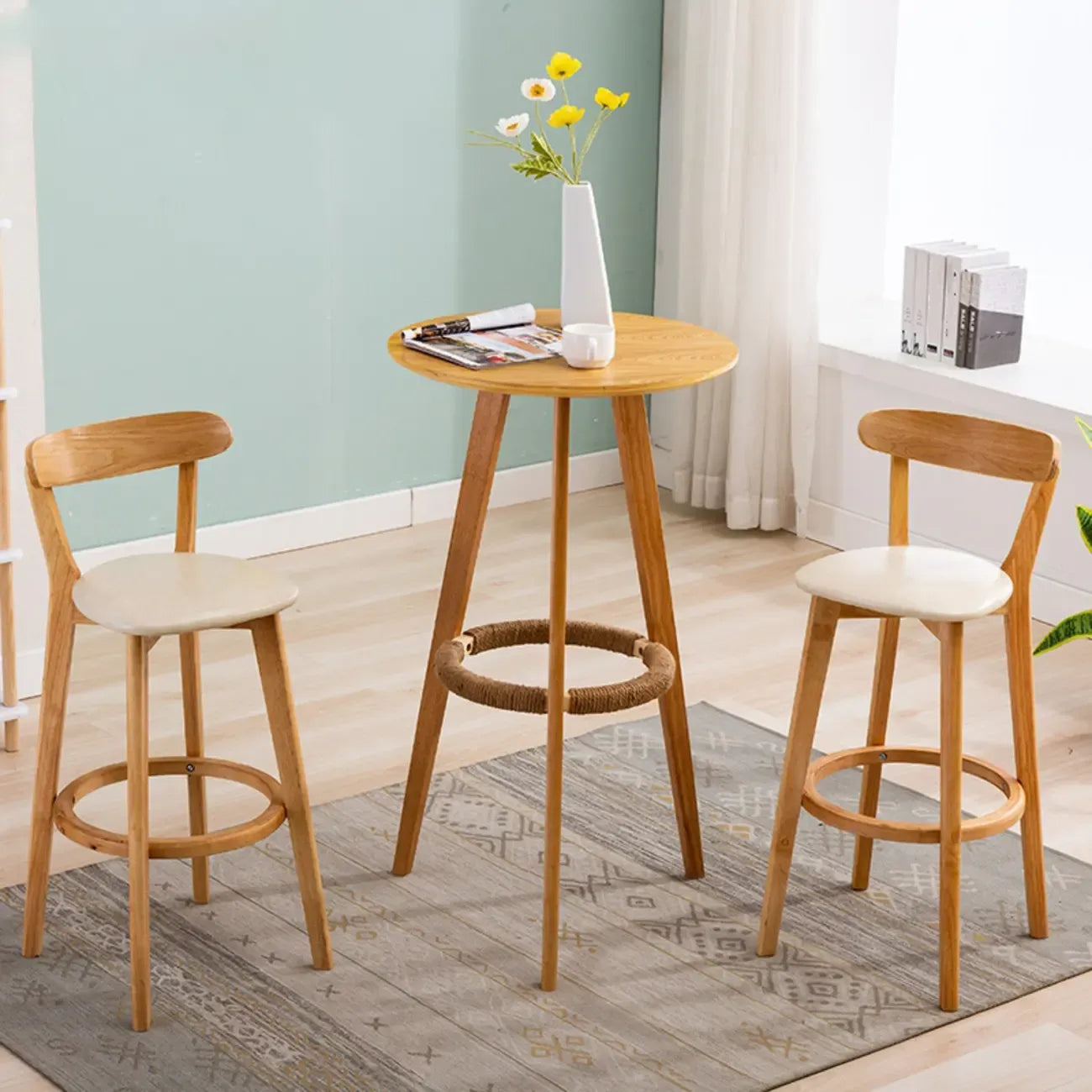 Table de bar moderne en bois avec tabourets ronds pour bistro