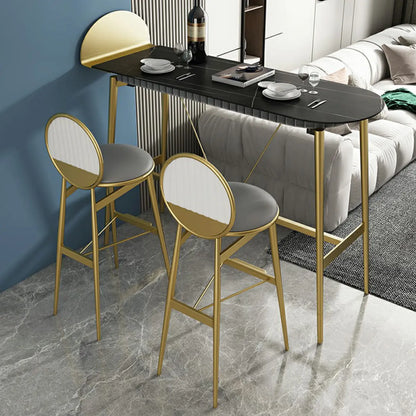 Table de bar design en métal noir avec repose-pieds doré pour intérieur moderne