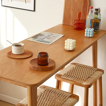 Table de bar rustique en bois massif avec pieds à tréteaux pour une maison moderne