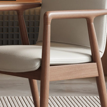 Fauteuil de salle à manger moderne en bois recouvert de similicuir