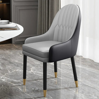 Chaise de salle à manger en similicuir, color block, accoudoirs inclinés et pieds en métal