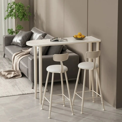 Table de bar moderne aux formes libres avec plateau en pierre blanche et structure en fer