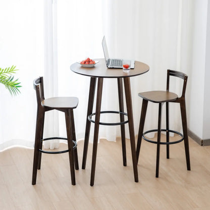Tables de bar rondes en bois brun à pieds hauts