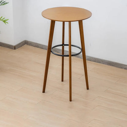 Tables de bar rondes en bois brun à pieds hauts