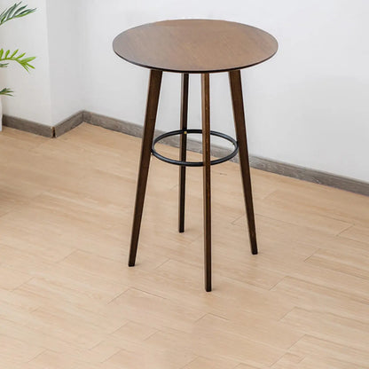 Tables de bar rondes en bois brun à pieds hauts
