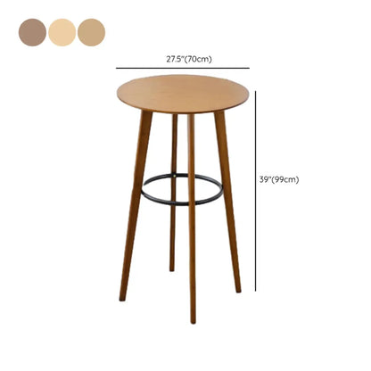 Tables de bar rondes en bois brun à pieds hauts