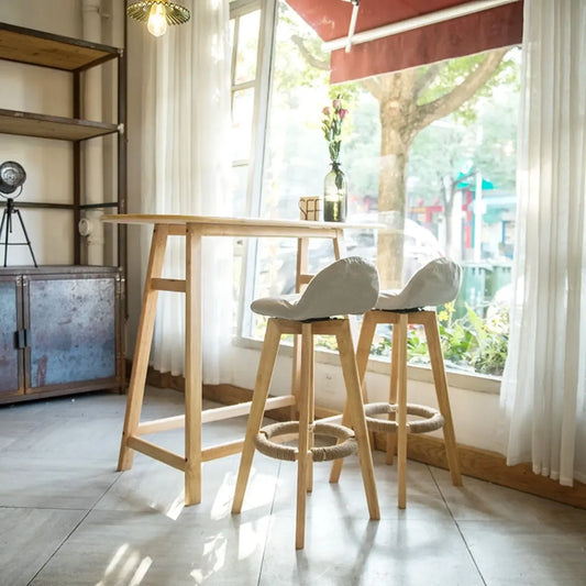 Table haute de bar scandinave en bois aux formes libres pour salle à manger