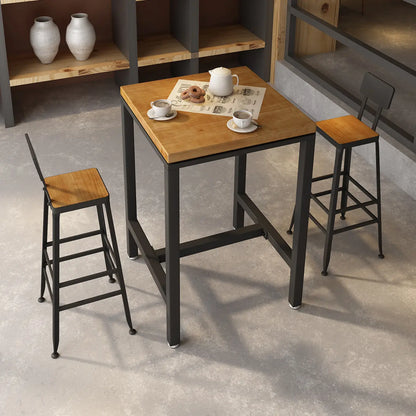 Table de bistrot carrée avec plateau en bois et repose-pieds en fer, plateau carré en bois et table de bistrot.