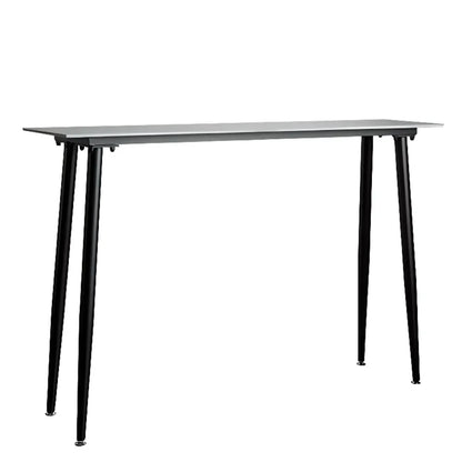 Table de bar moderne avec plateau en travertin gris et pieds en métal, idéale pour la salle à manger.