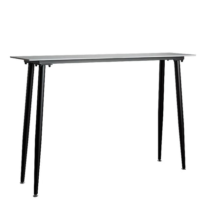 Table de bar moderne avec plateau en travertin gris et pieds en métal, idéale pour la salle à manger.