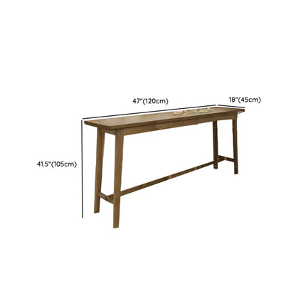 Tables de bar simples en bois brun avec repose-pieds