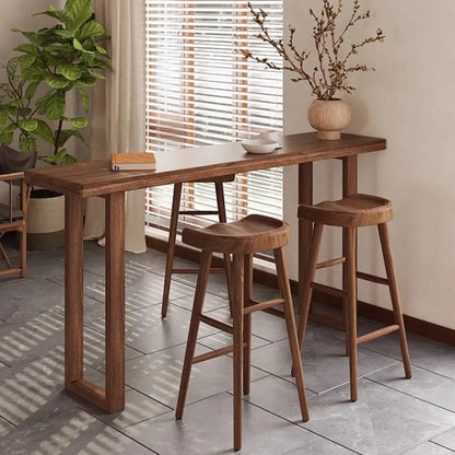 Table de bar décontractée en bois brun avec piètement traîneau