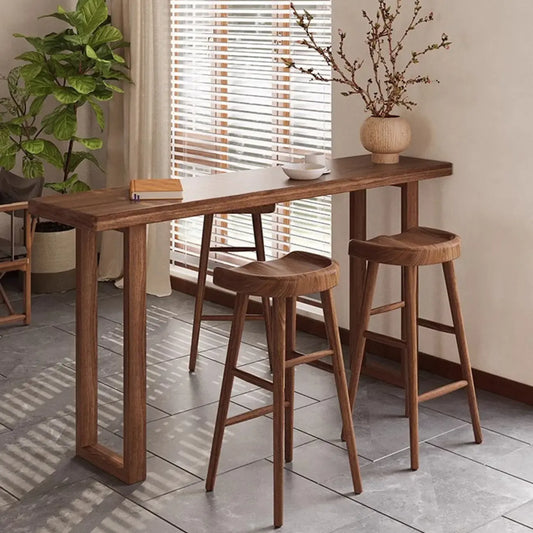 Table de bar décontractée en bois brun avec piètement traîneau