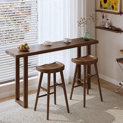 Table de bar décontractée en bois brun avec piètement traîneau