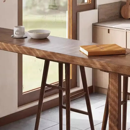 Table de bar décontractée en bois brun avec piètement traîneau