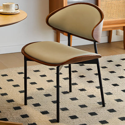 Chaise de salle à manger à dossier incurvé et assise en cuir noir
