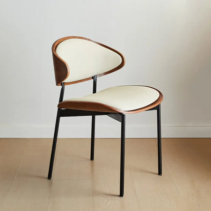 Chaise de salle à manger à dossier incurvé et assise en cuir noir