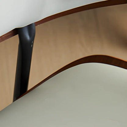 Chaise de salle à manger à dossier incurvé et assise en cuir noir