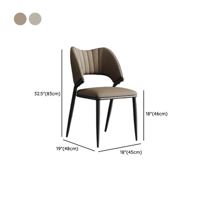 Chaise de salle à manger moderne sans accoudoirs, dossier incurvé, en similicuir.