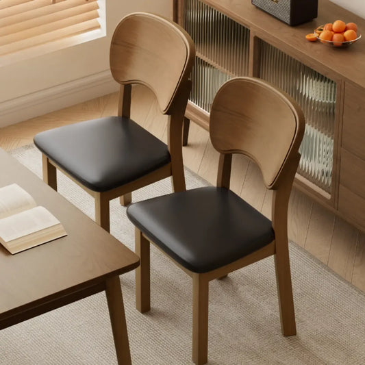 Chaise de salle à manger rembourrée de style vintage en bois noir avec assise confortable