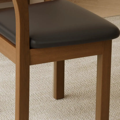Chaise de salle à manger rembourrée de style vintage en bois noir avec assise confortable