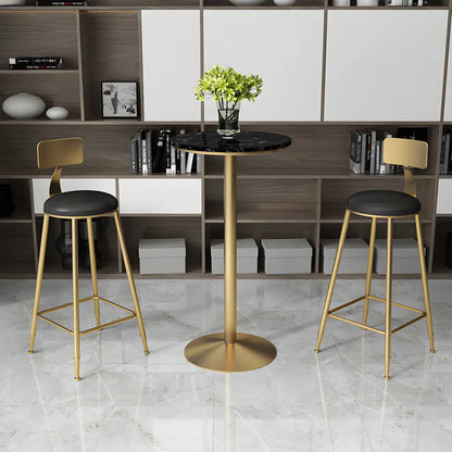 Table de bar élégante en marbre nordique avec piètement en métal doré