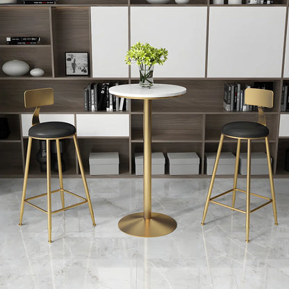 Table de bar élégante en marbre nordique avec piètement en métal doré