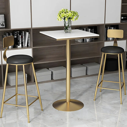 Table de bar élégante en marbre nordique avec piètement en métal doré