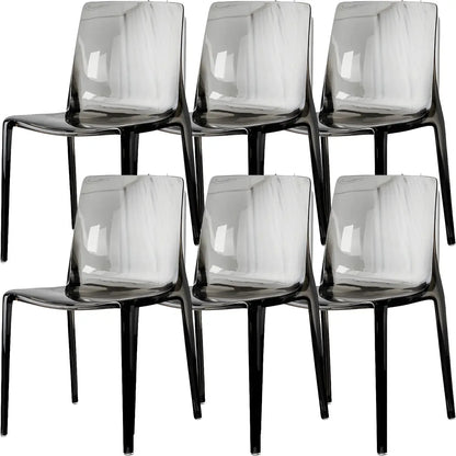 Chaise de salle à manger sans accoudoirs à dossier bas en acrylique ambré